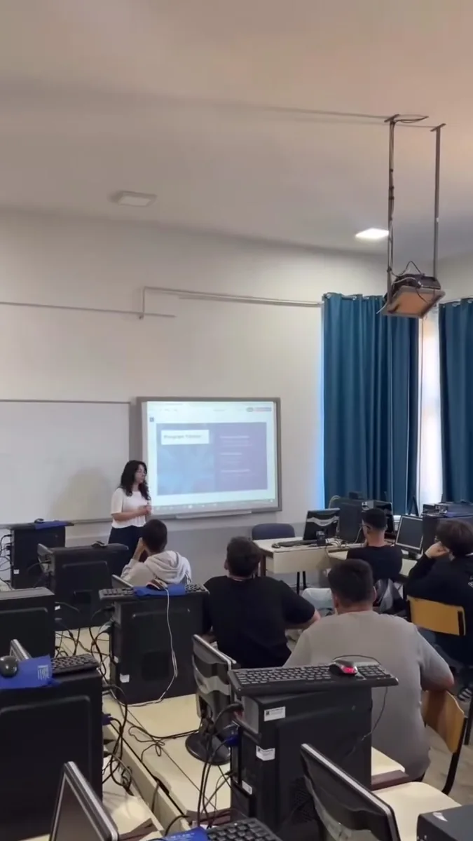 School presentation at Ibrahim Temo Gymnasium, from the archived video.